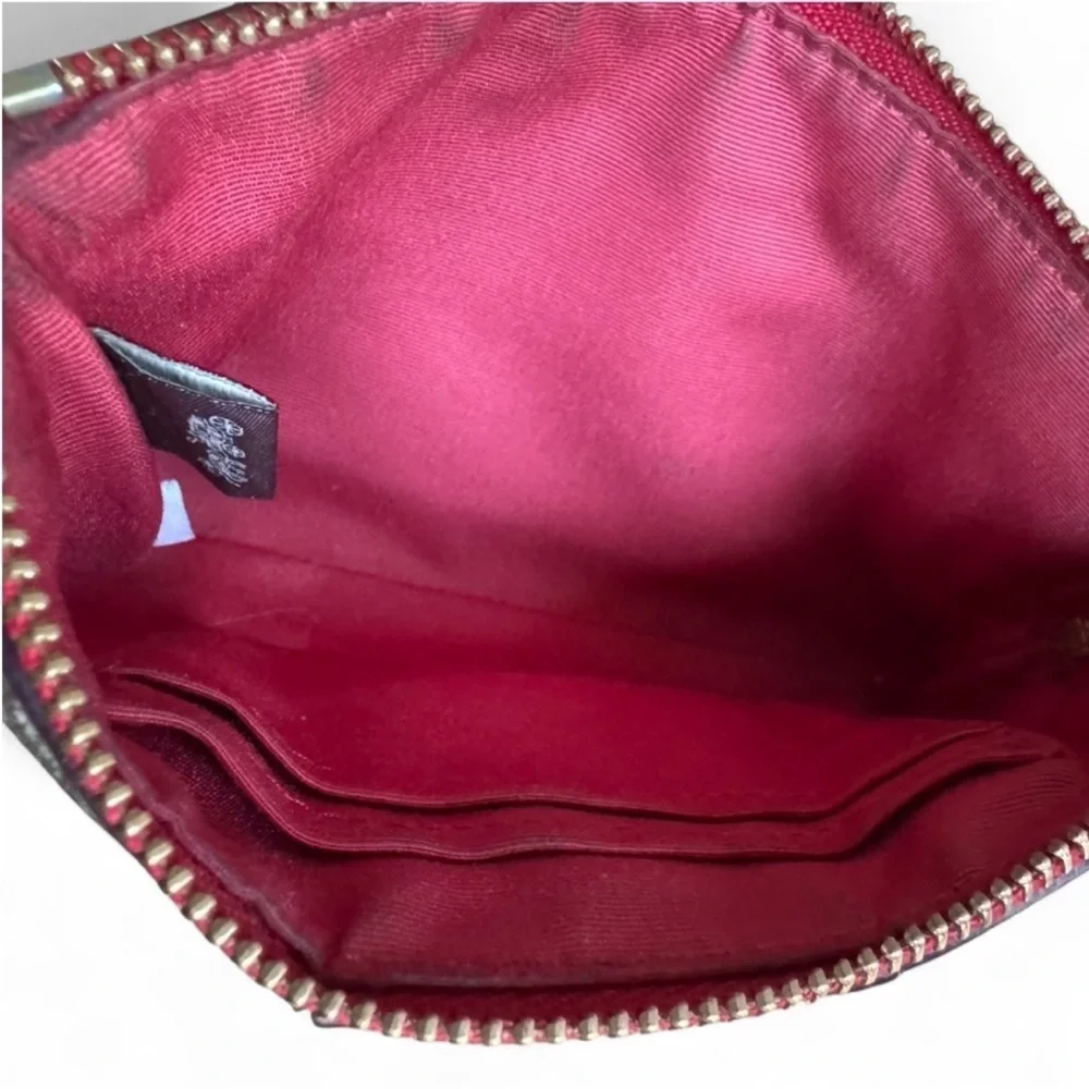 Coach Signature wristlet in light Brown and Red